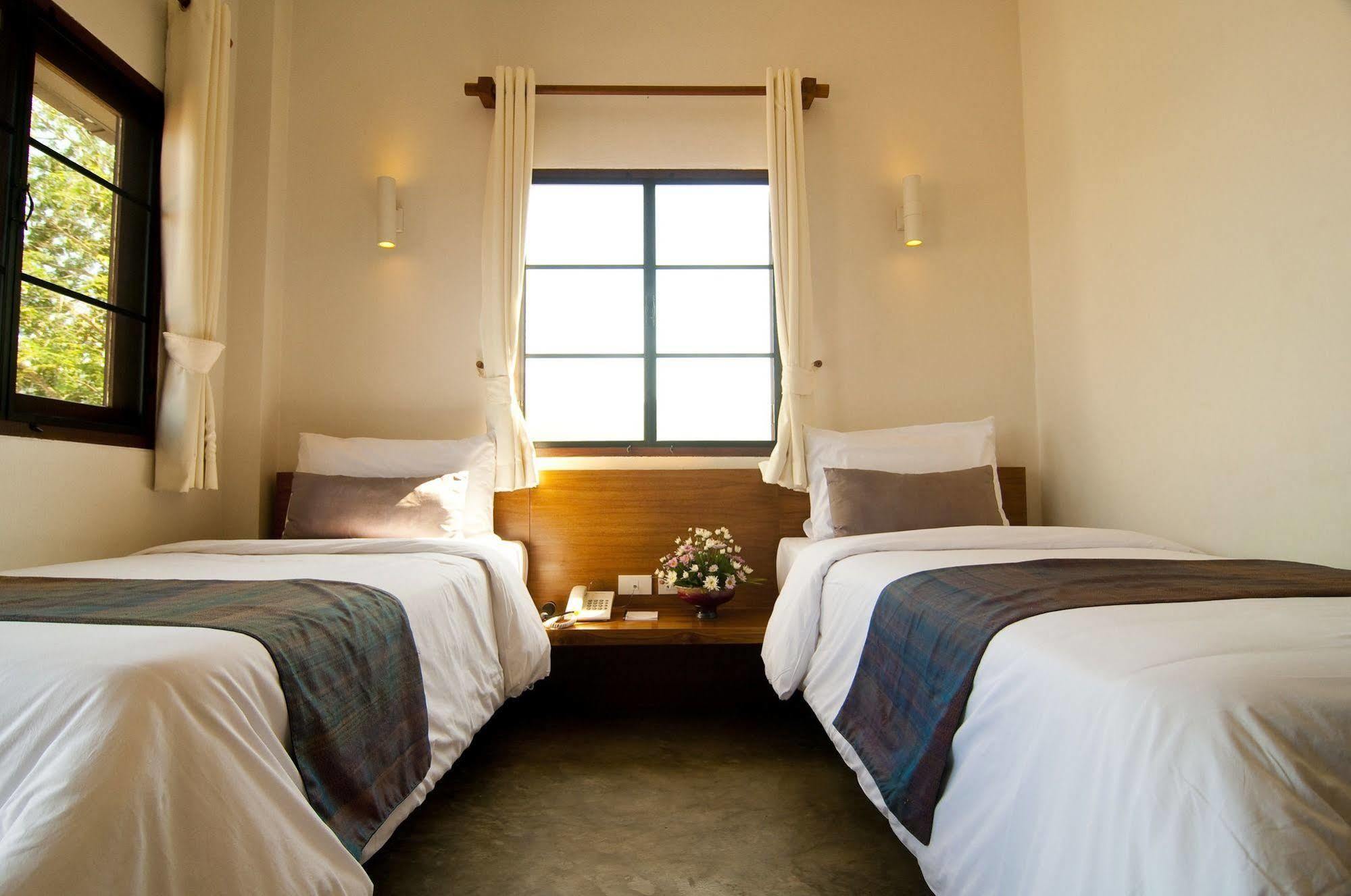 Lilu Pai Hotel Bagian luar foto